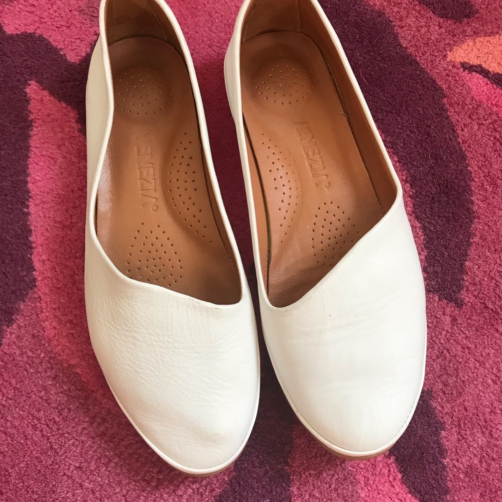 White leather loafers